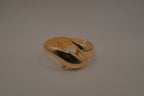 Gold tone two interlocking dolphins cuff bracelet