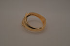 Gold tone two interlocking dolphins cuff bracelet