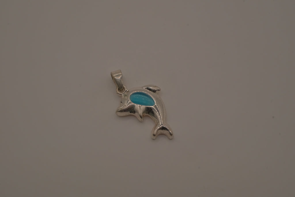 Dolphin pendant inlaid with vibrant blue stone