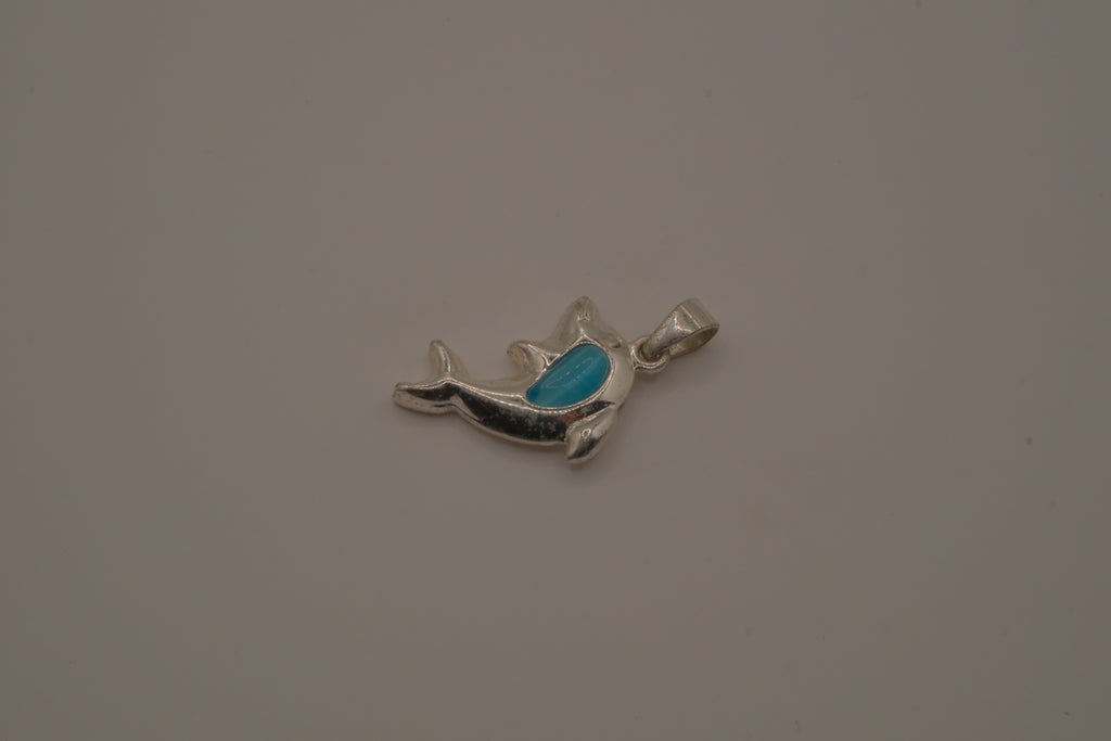 Dolphin pendant inlaid with vibrant blue stone