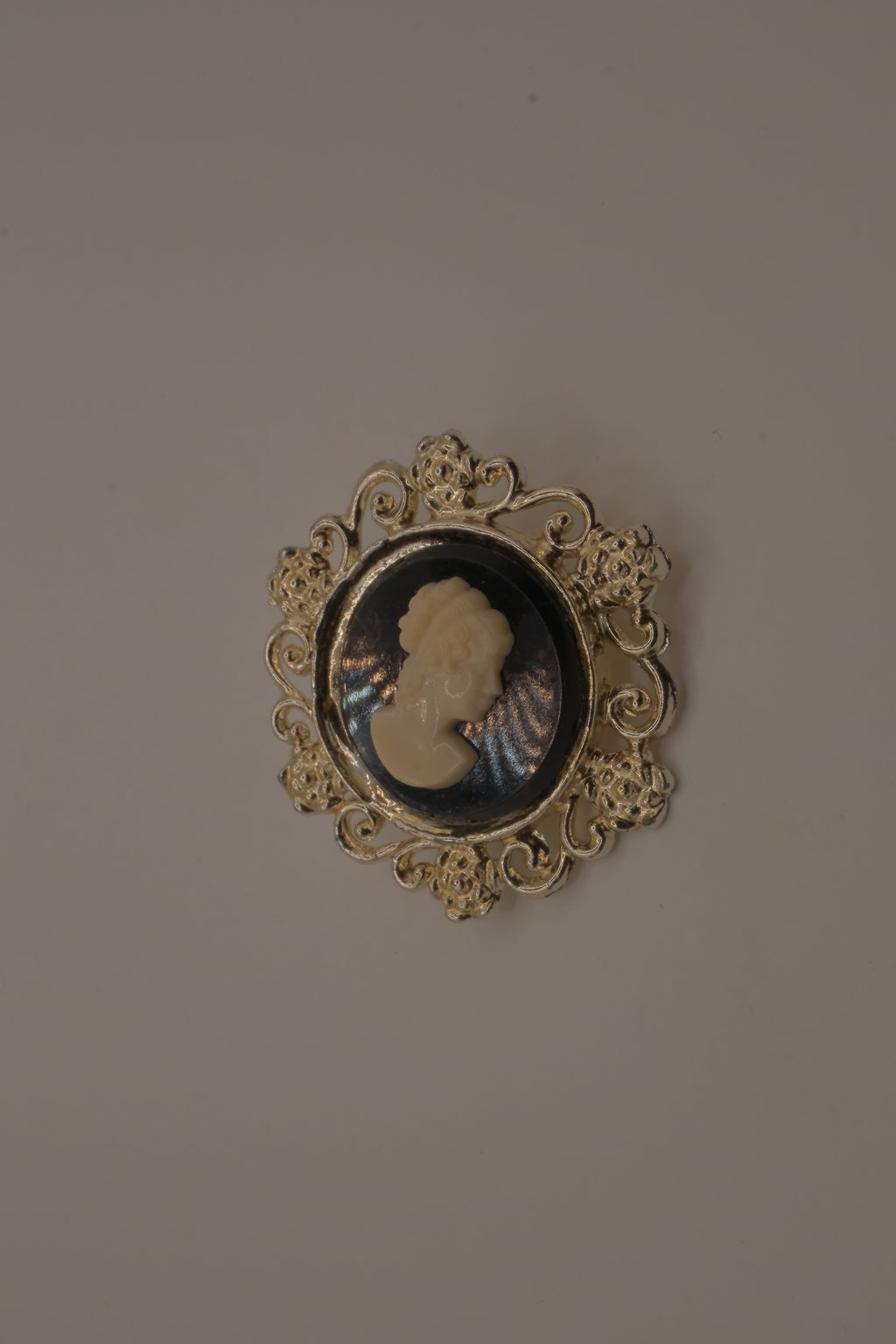 Vintage black and white cameo brooch