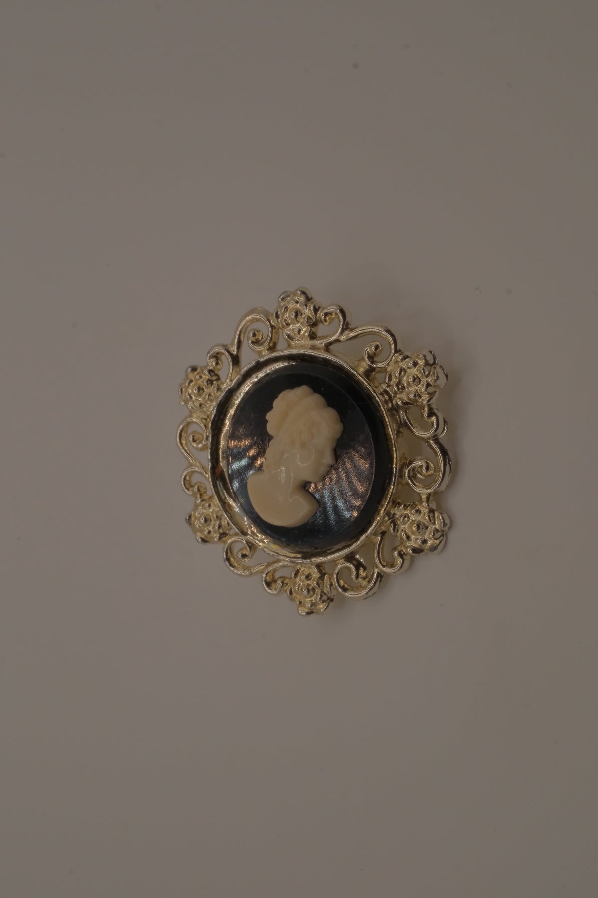 Vintage black and white cameo brooch