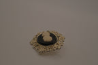 Vintage black and white cameo brooch