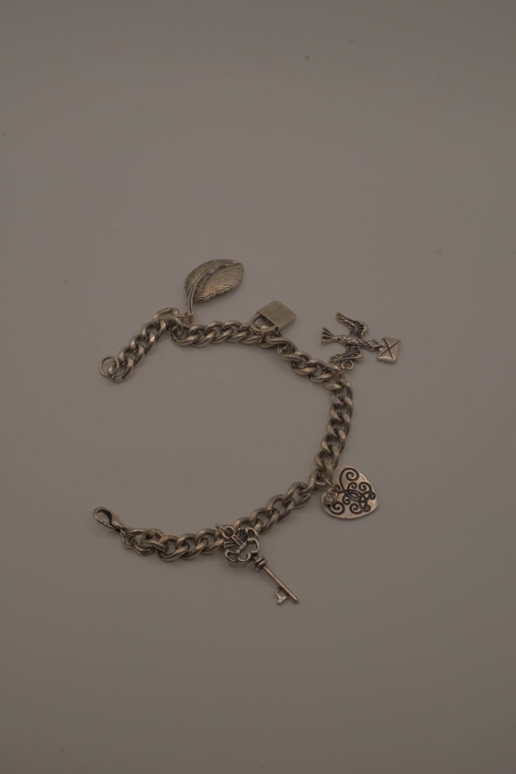 Vintage silver tone charm bracelet