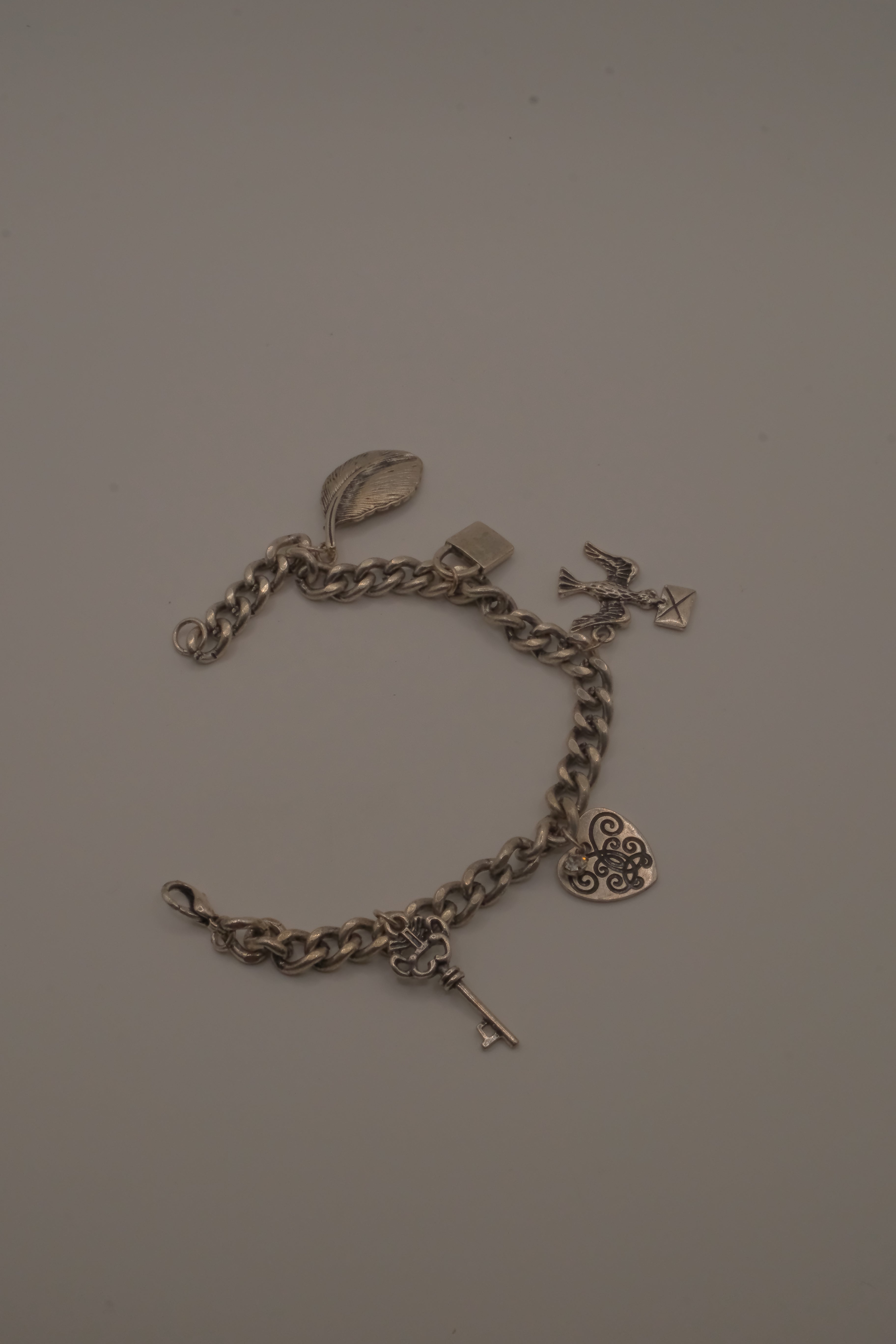 Vintage silver tone charm bracelet