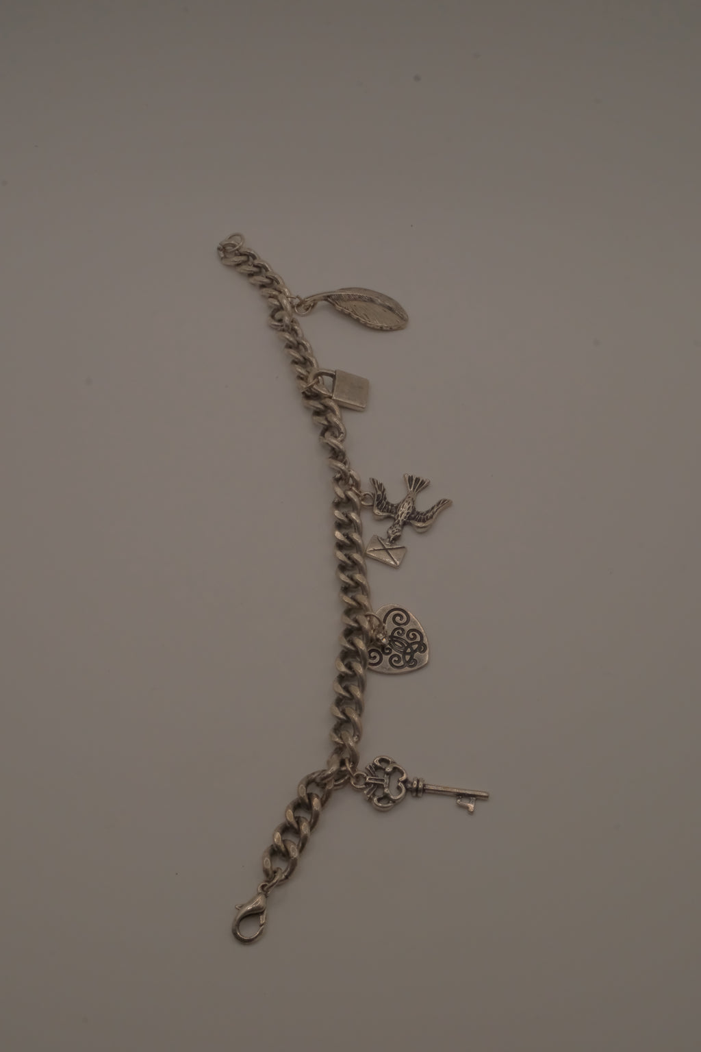 Vintage silver tone charm bracelet