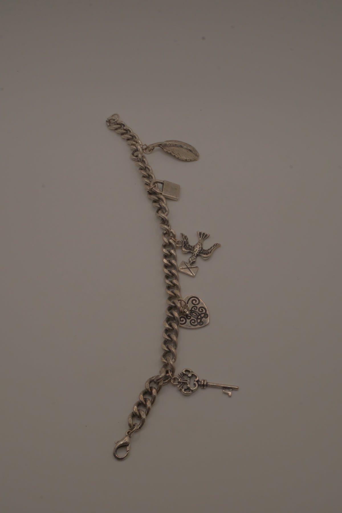 Vintage silver tone charm bracelet