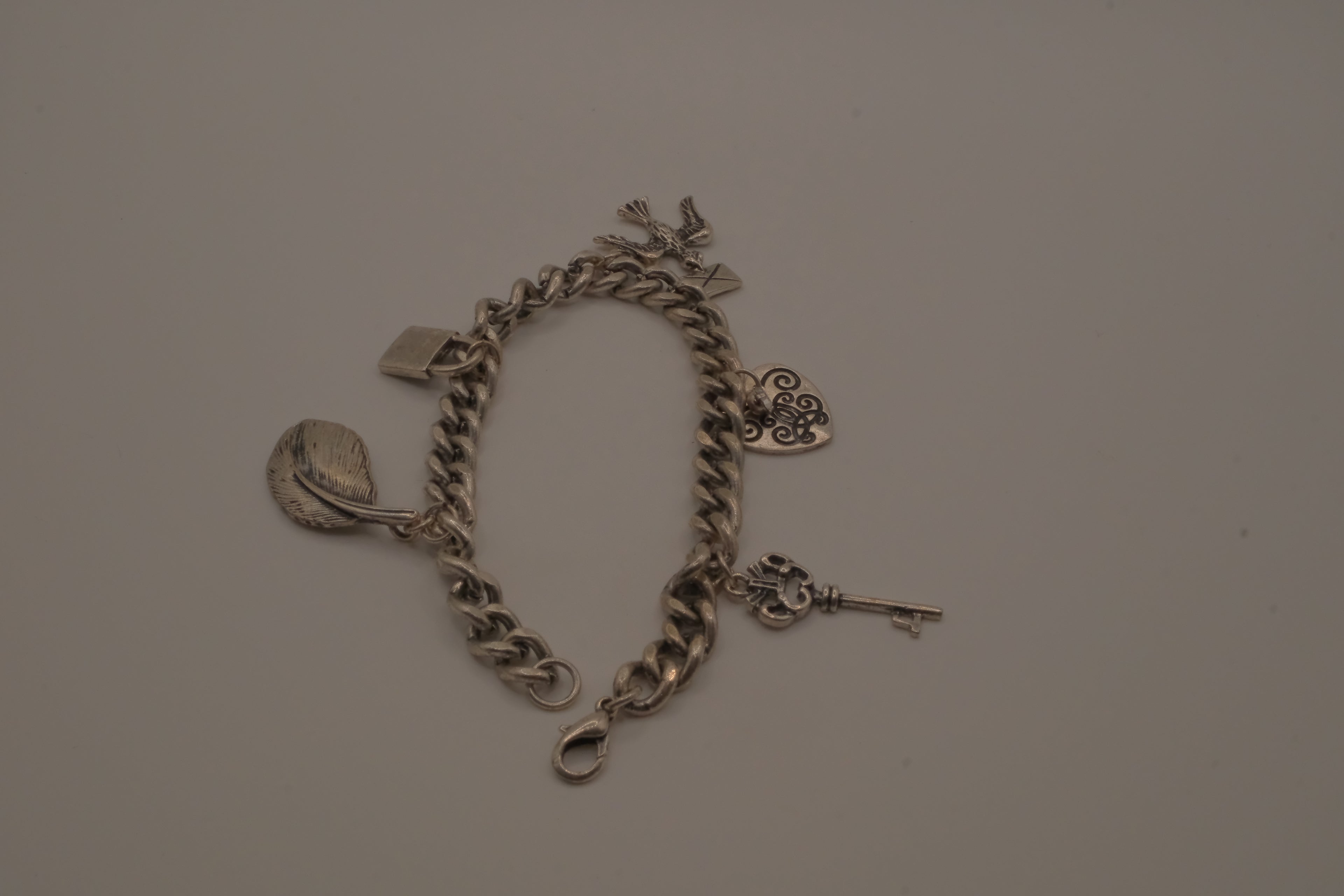 Vintage silver tone charm bracelet