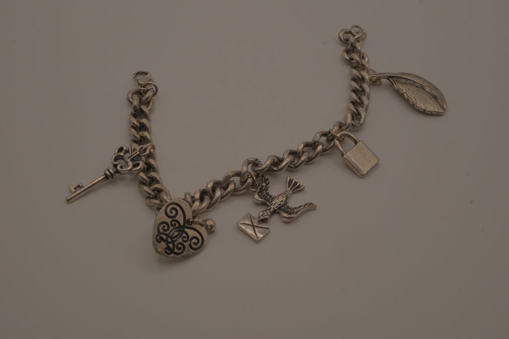 Vintage silver tone charm bracelet