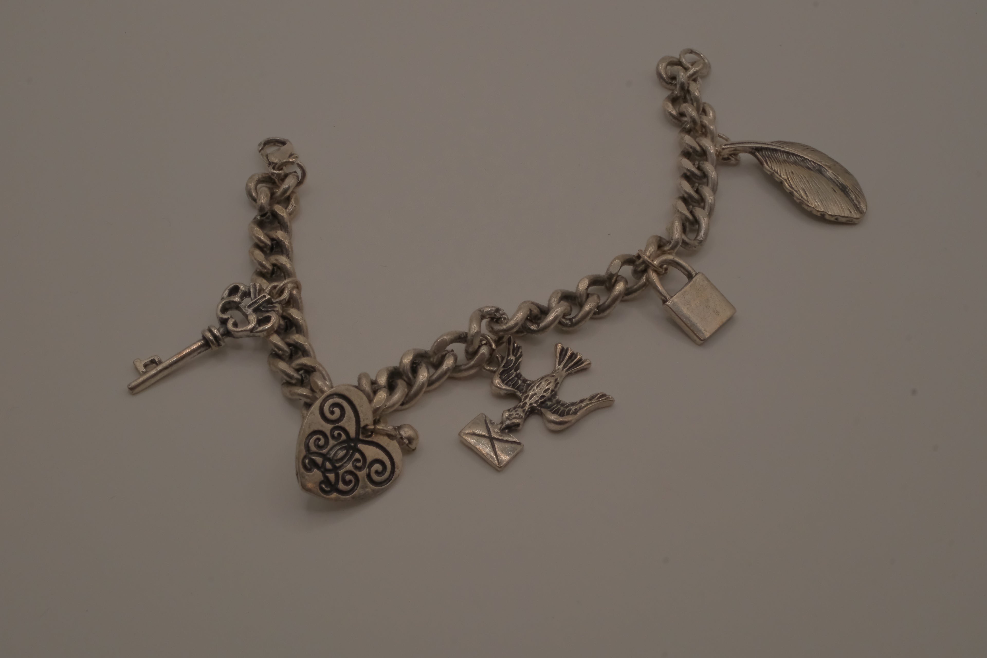 Vintage silver tone charm bracelet