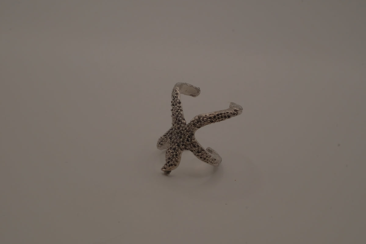 Silver adjustable starfish statement ring