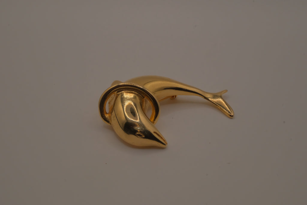 Vintage dolphin jumping through a hoop brooch pin