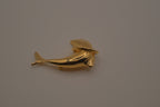 Vintage dolphin jumping through a hoop brooch pin