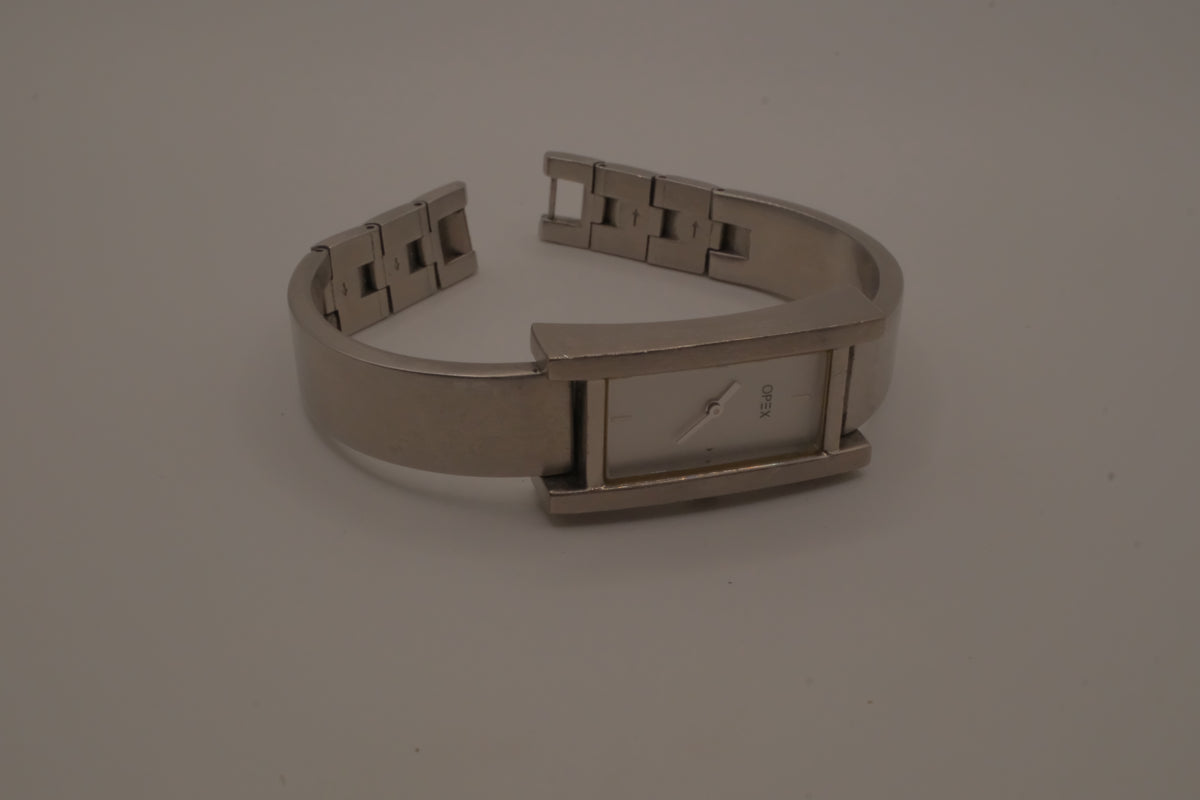 OPEX Paris minimalist rectangular stainless steel bangle watch