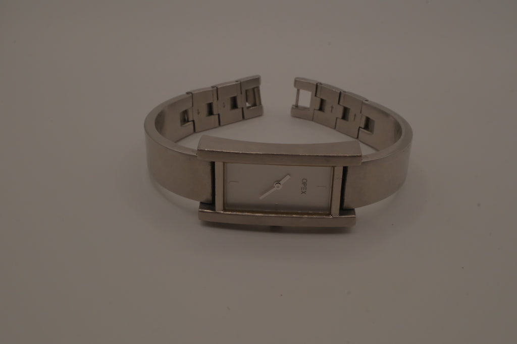 OPEX Paris minimalist rectangular stainless steel bangle watch