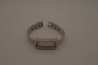 OPEX Paris minimalist rectangular stainless steel bangle watch