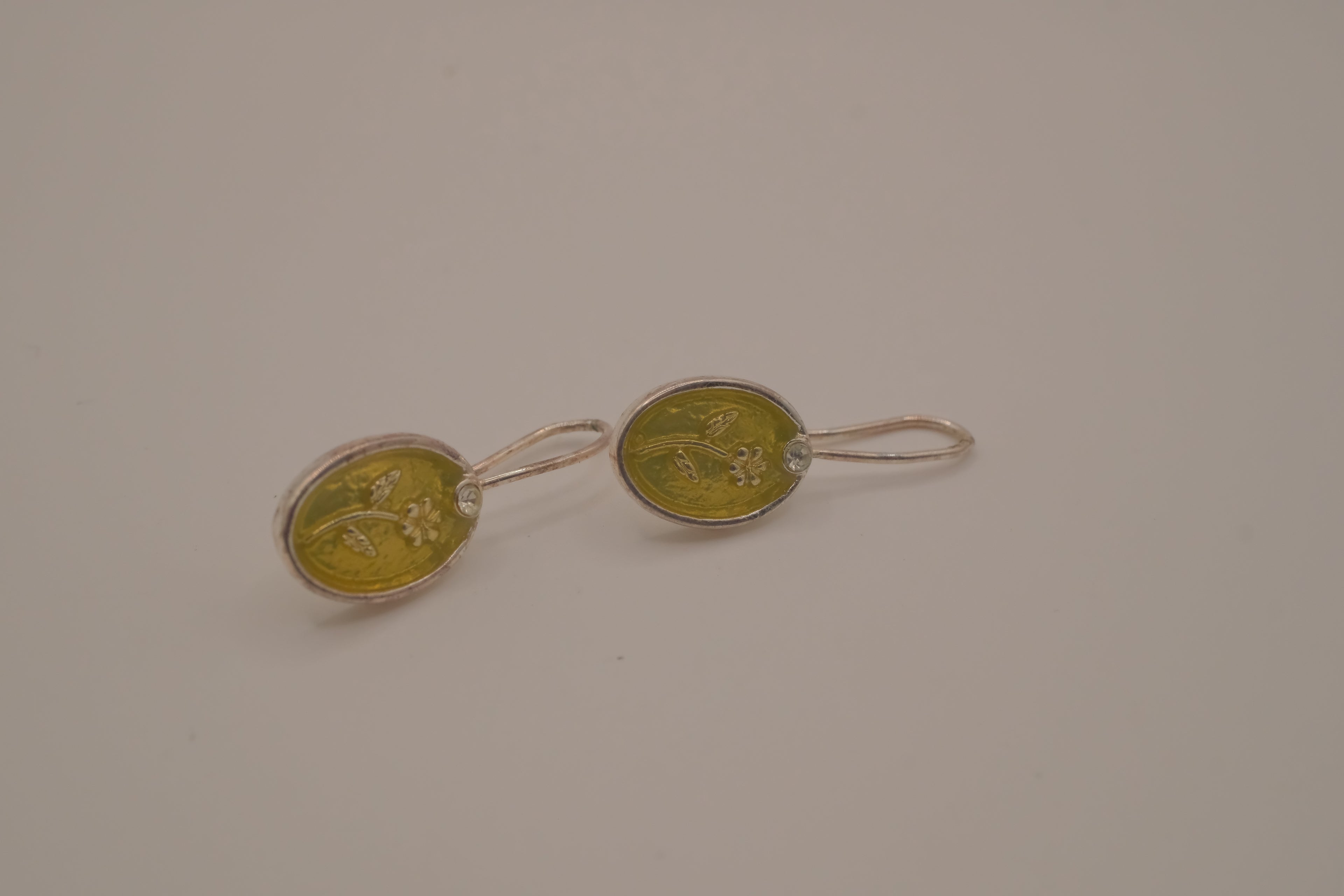 Embossed flower dangle earring