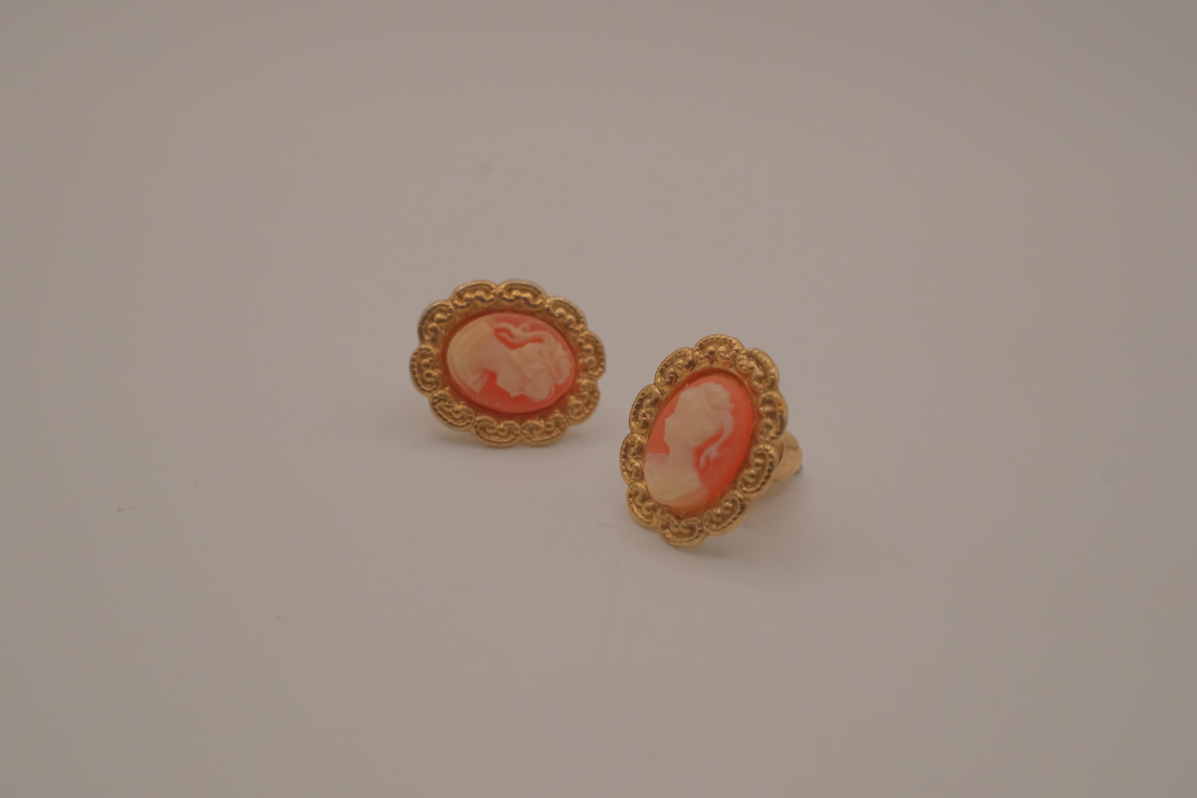 Vintage peach and cream cameo earring