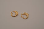 Gold dolphin hoop earring