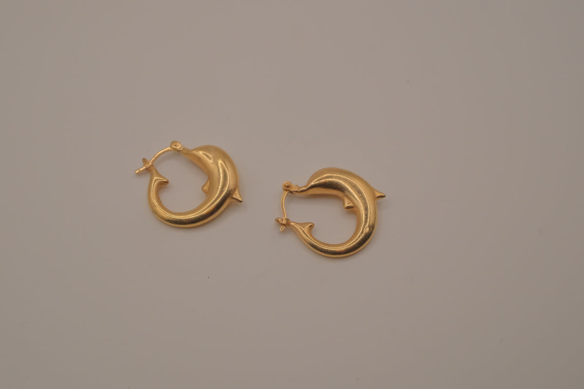Gold dolphin hoop earring