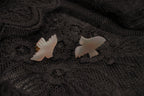 Carved mother-of-pearl dove earring
