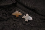 Carved mother-of-pearl dove earring