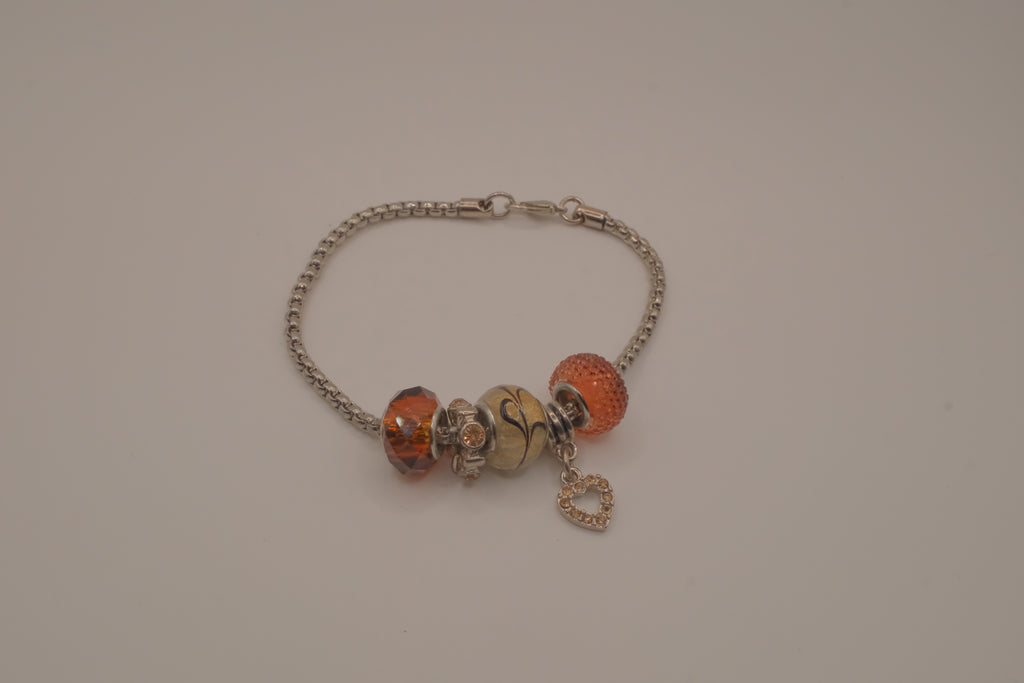 November themed silver snake-chain charm bracelet