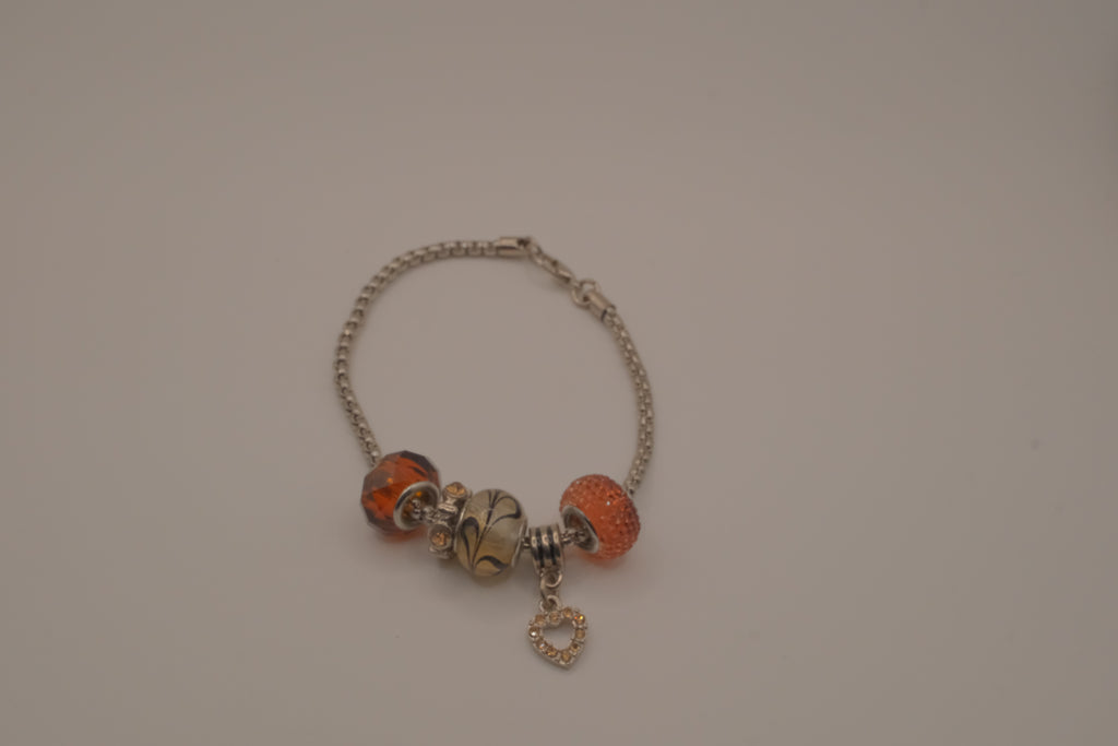 November themed silver snake-chain charm bracelet