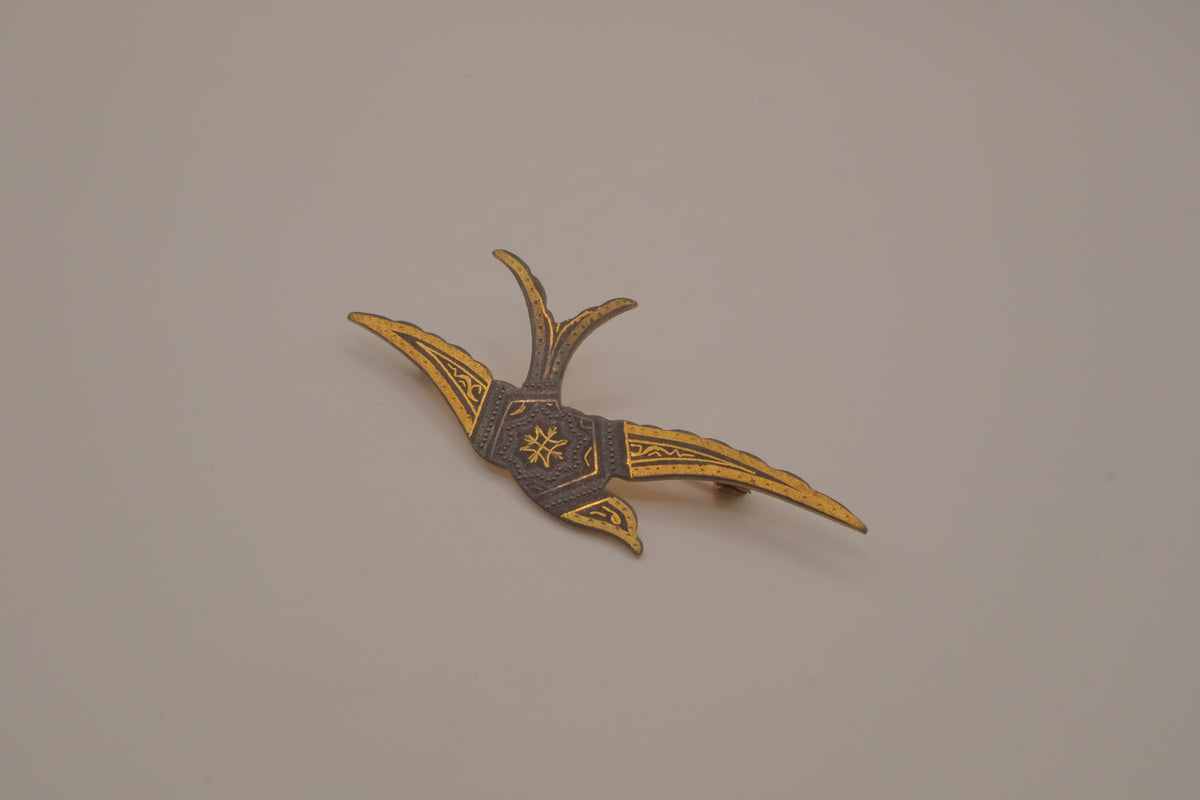 Vintage Damascene swallow bird brooch