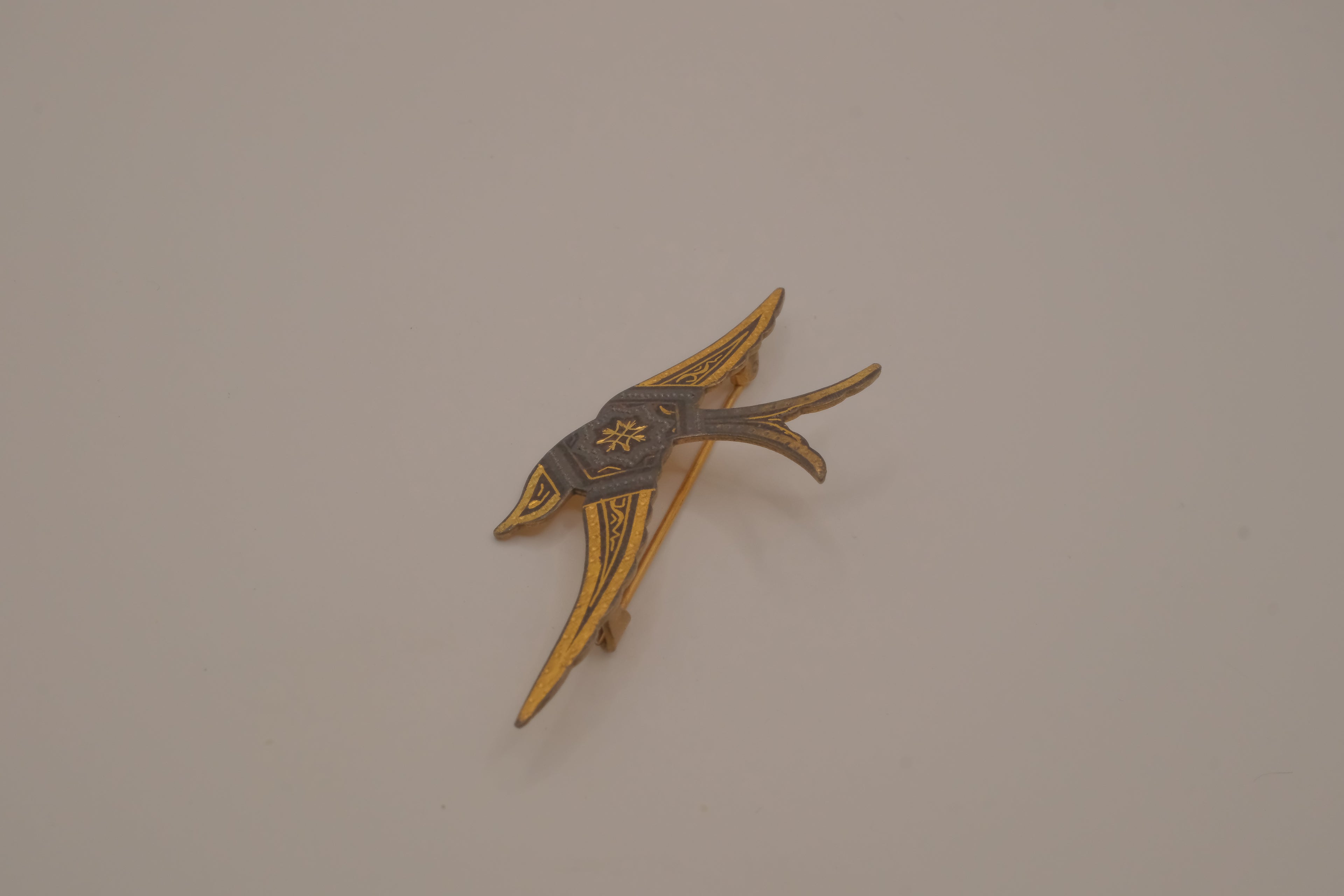Vintage Damascene swallow bird brooch