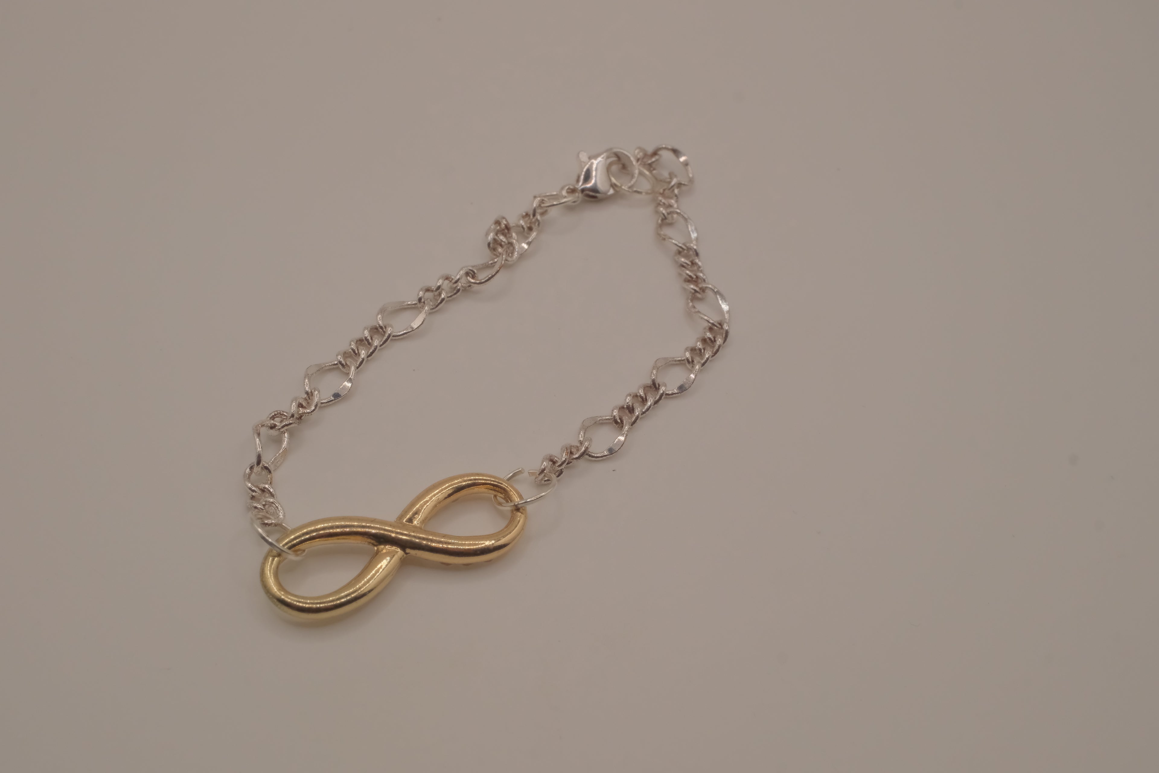 Two-tone infinity chain bracelet