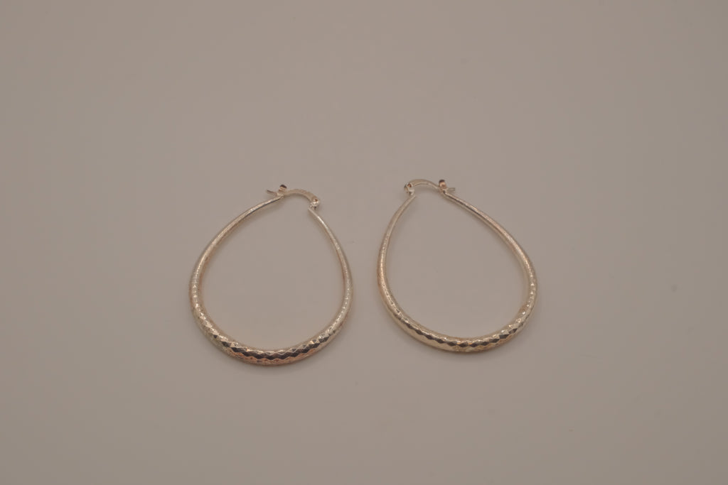 Sterling silver teardrop-shaped hoop earrings