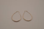 Sterling silver teardrop-shaped hoop earrings