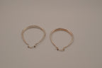 Sterling silver teardrop-shaped hoop earrings