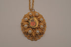 Vintage Victorian Revival style oval filigree pendant necklace