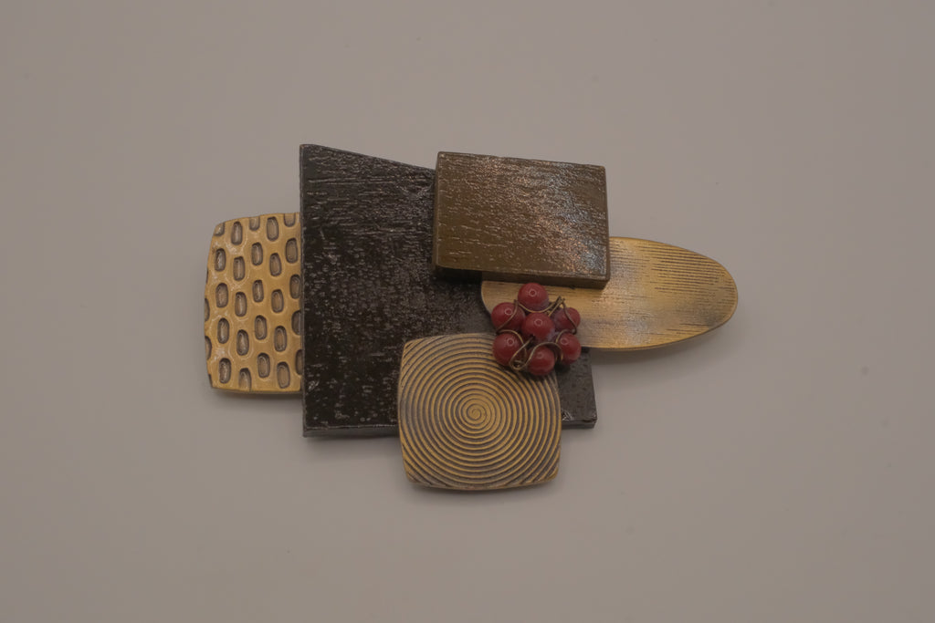 Reworked abstract mixed-metal brooch