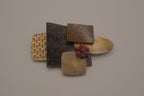 Reworked abstract mixed-metal brooch