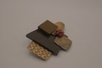 Reworked abstract mixed-metal brooch