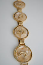 Vintage gold-tone link bracelet featuring seahorse motifs