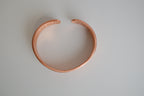 Copper cuff bracelet with engraved horse design