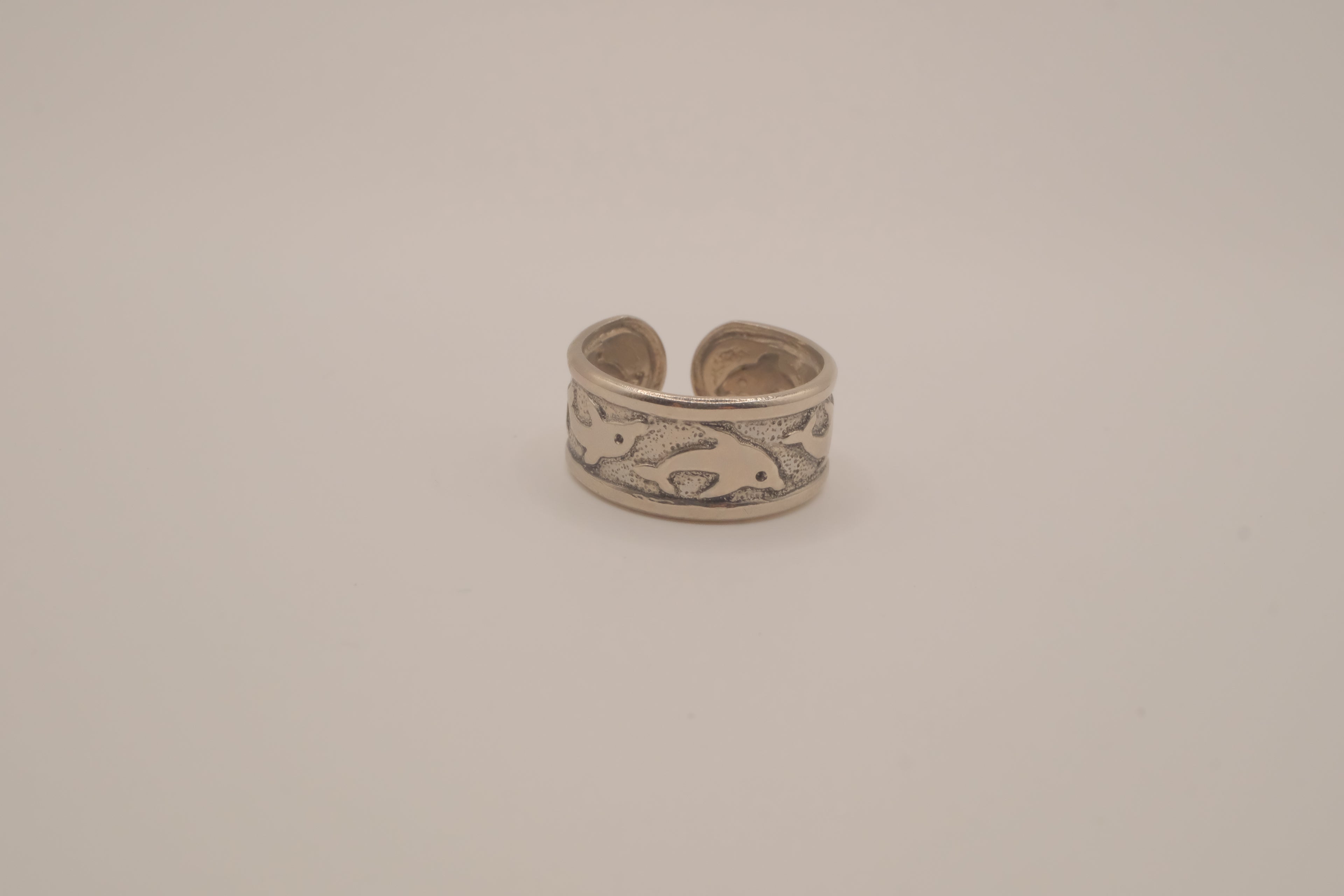 Silver tone dolphin cuff ring