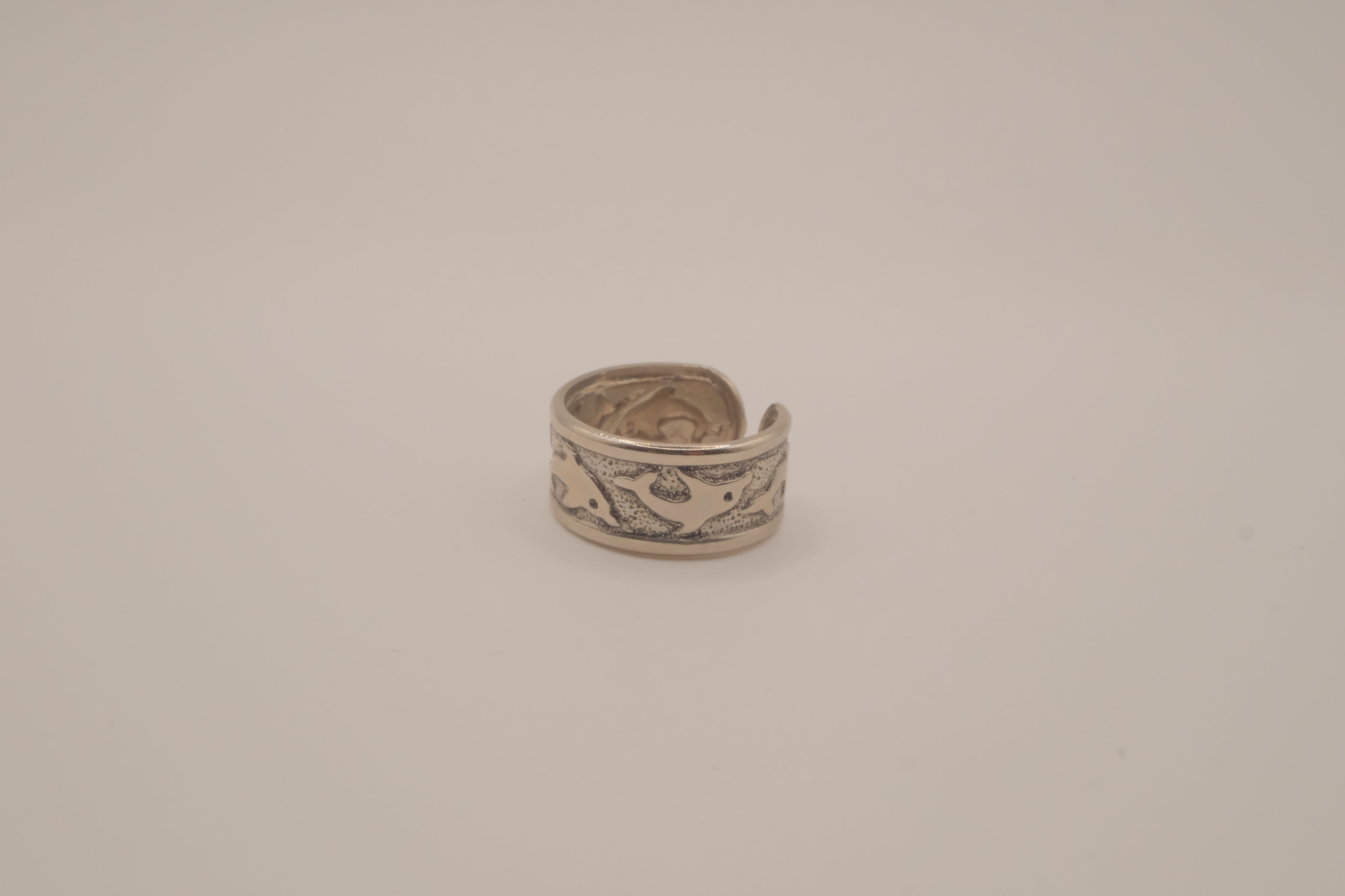 Silver tone dolphin cuff ring