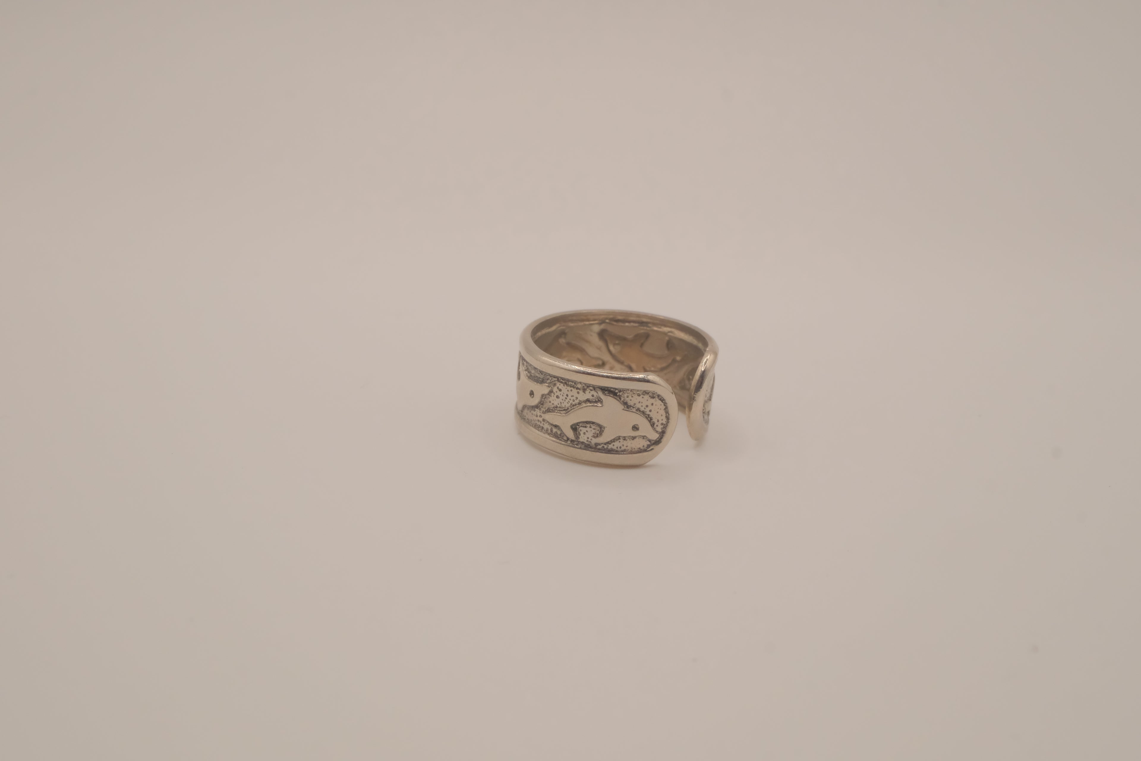 Silver tone dolphin cuff ring