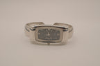 Silver tone rectangular cuff watch