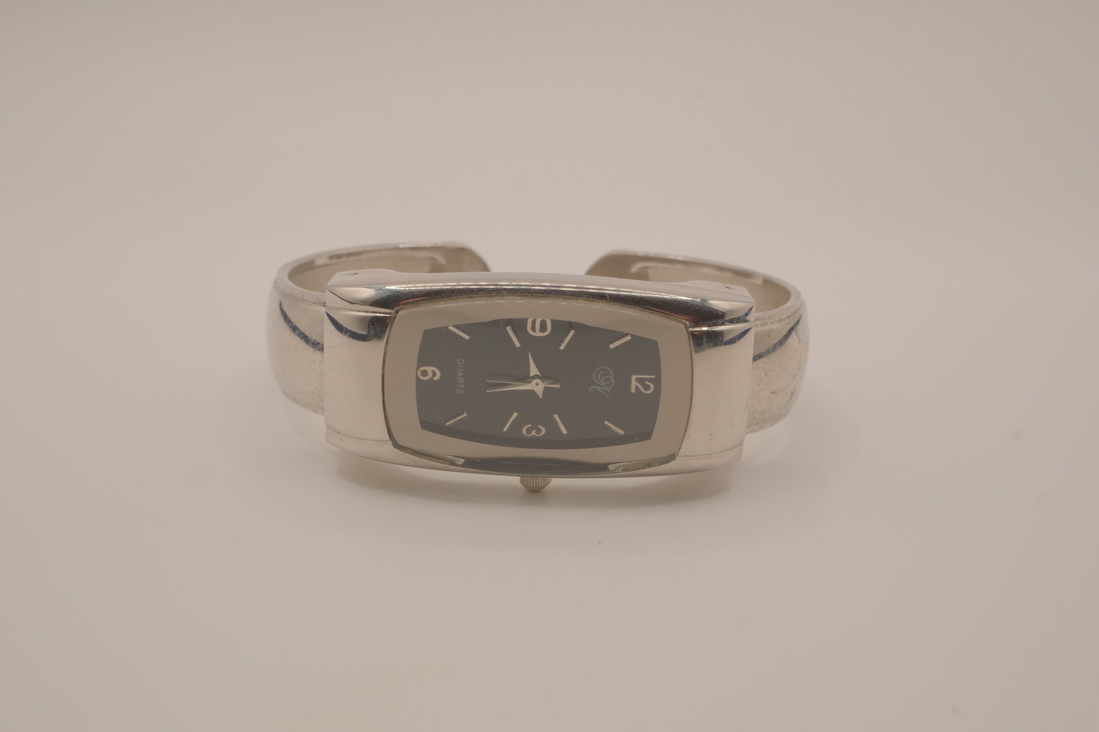Silver tone rectangular cuff watch