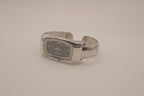 Silver tone rectangular cuff watch