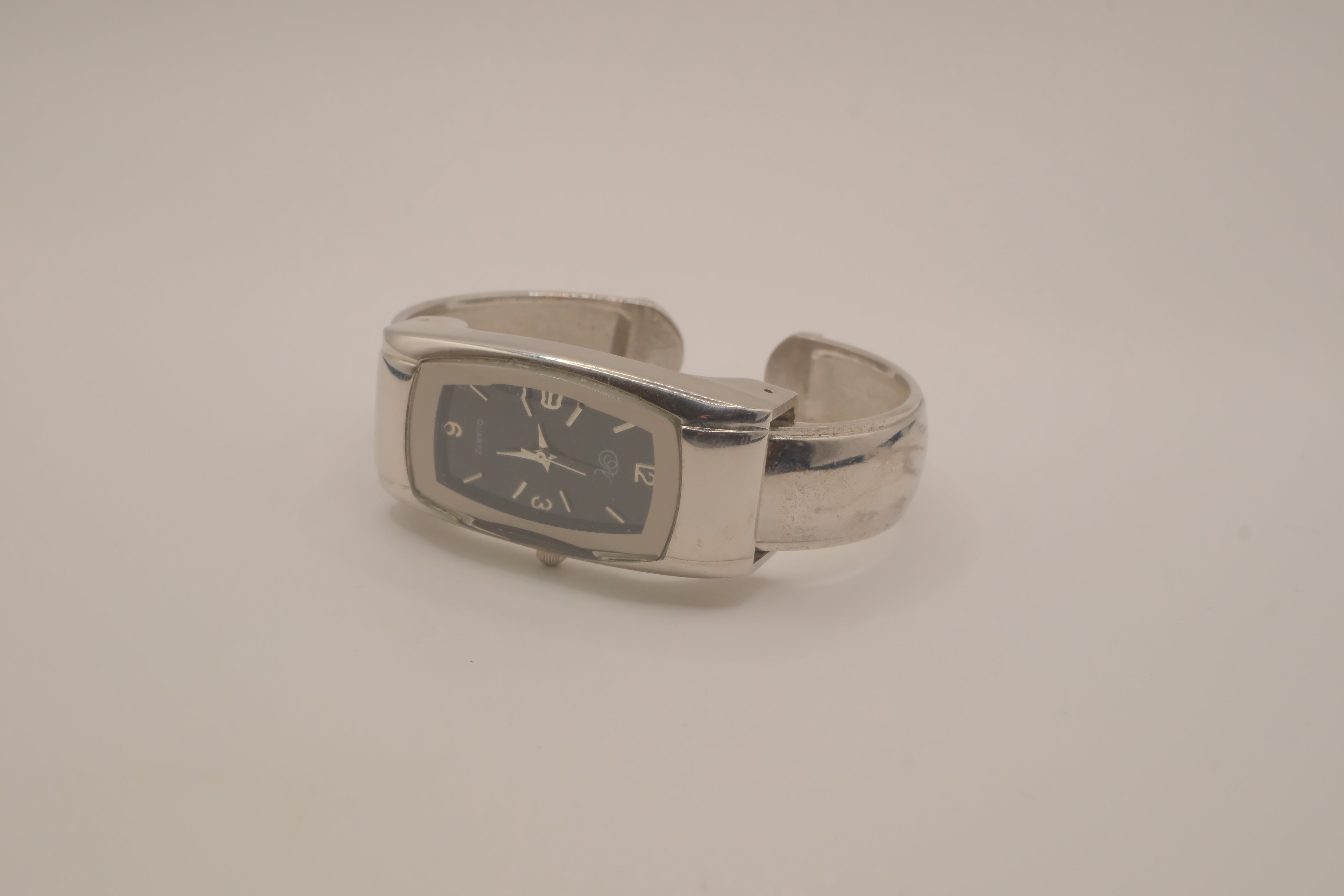 Silver tone rectangular cuff watch