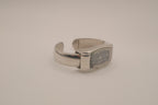 Silver tone rectangular cuff watch