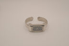 Silver tone rectangular cuff watch