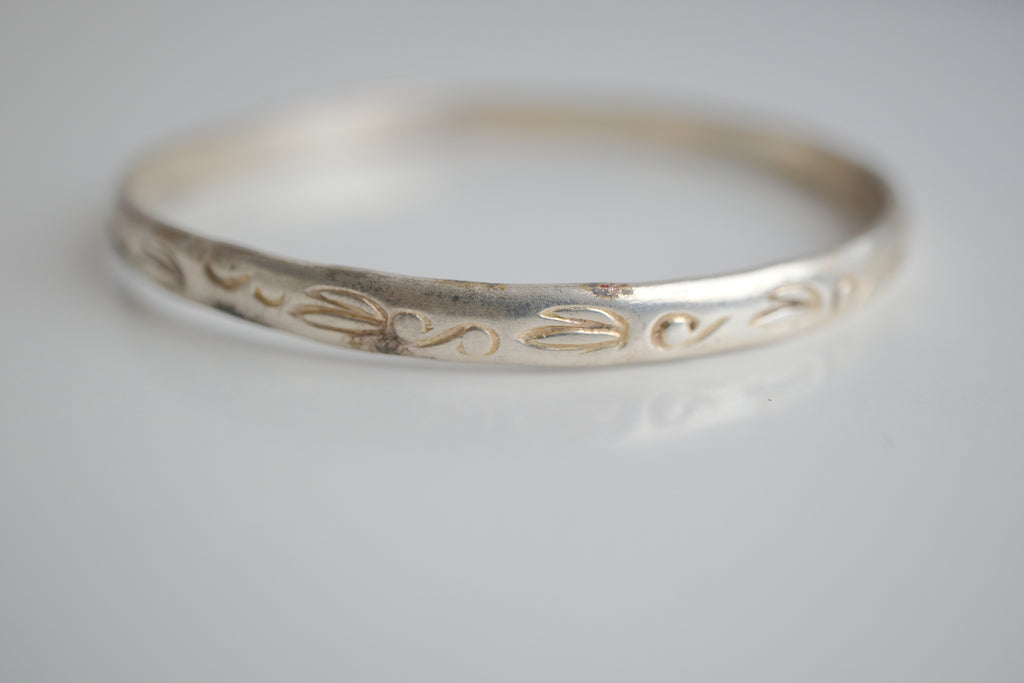 Sterling silver bangle bracelet with etched artwork